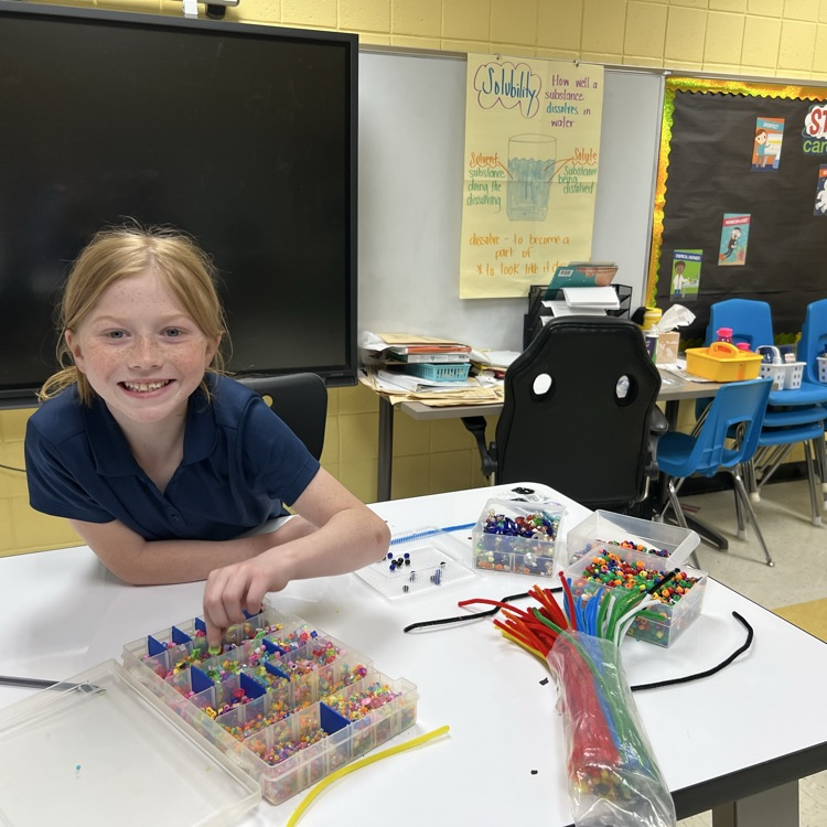 PHillPanthers's tweet photo. Art Club had a blast making beautiful beaded hearts for Mother's Day!! We even had a special visitor ~ Daisy the puppy! Look at those smiles! 🐾❤️ https://t.co/ZDJa1trh63
