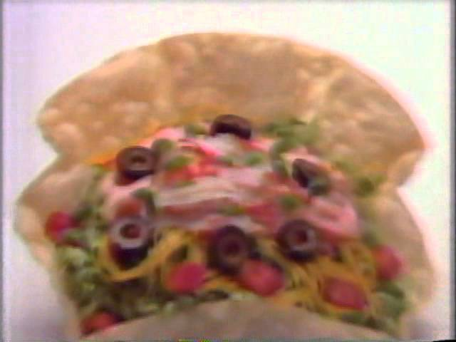Taco Bell's Seafood Salad – shrimp, crab, olives, tomatoes &amp; more stuffed in a tortilla shell. They actually tried selling seafood at Taco Bell in '93... it didn't end well 😂Who was brave enough to order Taco Bell seafood back in the day? #FastFoodFails #90sNostalgia #TacoBell