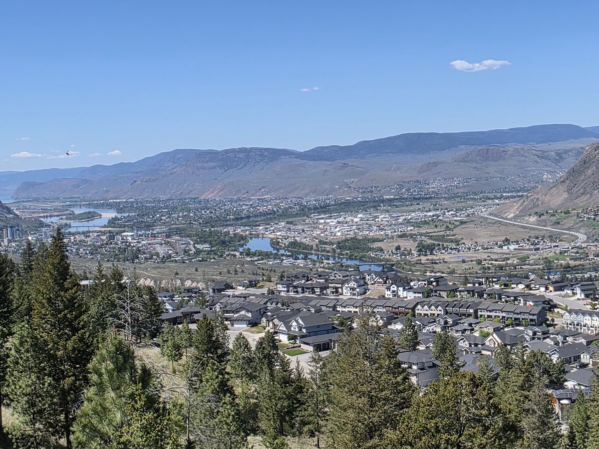 TruthWorksLoops's tweet photo. The @cityofkamloops is an interesting place. It's a natural intersection for most of Canada's land transportation networks due its geography and this is reflected in our human geography. All of BC's foundational people groups have stories here, some quite infamous. 

Kamloops was the first city in North America to elect a Mayor of Chinese ancestry. Peter Wing was first elected here in 1966 and was very popular, serving the city for 3 terms. He was also the first mayor of Kamloops to have been born here. 

Kamloops is home to 2 Sikh gurdwaras, unusual for a city of its size. Rumour is that the second gurdwara was funded by the notorious Ajaib Bagri, an accused in the Air India bombing. If the rumour is true, I guess Bagri must have used the funds from his career as a sawmill worker to build that huge and beautiful gurdwara. Rumour is also that the two gurdwaras do not get on well, and this has extended into political scuffles from time to time. 

Although all the land in the picture is the unceded homeland of the T'Kemlups band, only the middle to centre of the picture is where T'Kemlups was traditionally allowed to derive income from their territory. It has progressed at a much faster clip than the @cityofkamloops over the last few decades, in fact incorporated Kamloops has fallen behind while T'kemlups has gone further ahead. 

The T'Kemlups band is of course at the centre of two major news stories in Canada. The first is the aforementioned and much twisted land claim, filed back in 2015. The band is also ground zero for the Every Child Matters campaign which kicked off when all of Canada was told the remains of 215 children were confirmed to have been found on the reserve. 

Kamloops -our media and local government include many complete idiots who are setting us back but our city is much more interesting on a broader scale than one would think.