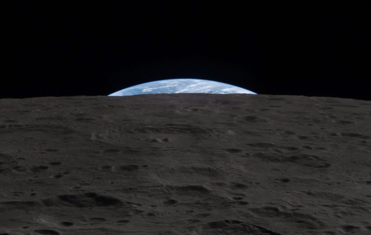 JPMajor's tweet photo. Earth peeking over the Moon's horizon; a piece of one of the thousands of photos from the Artemis II mission shared online by NASA this past weekend https://t.co/iv7a9MkMFZ
