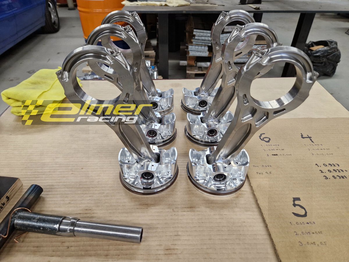 ElmerRacing's tweet photo. 4000hp v6 first engine assembly progress.
Rods, bushings, pins, clips, pistons, piston rings. All looking good. Tested for rotation clearance in the crank case earlier.
Custom tool to mount piston pin clips in the bottom left of the picture. Crazy stiff clips, hence the need for a tool, but should stay in there even at max rpm (well above 11,000rpm)!