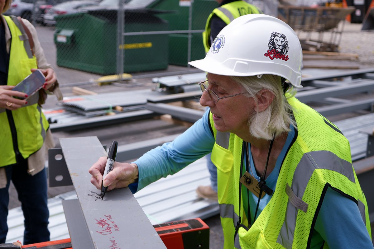 nicholasquality's tweet photo. Board members were beaming with excitement at Lincoln Middle School! The Mount Prospect School District 57 Board of Education joined us on-site for a tour and signed a beam that will be part of the new school’s new building. https://t.co/3bZYlqKjZT