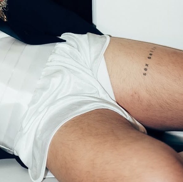 SLUTTY SHORTS, JUICY THIGHS , SEX SELLS TAT. HE WANTS TO KILL US