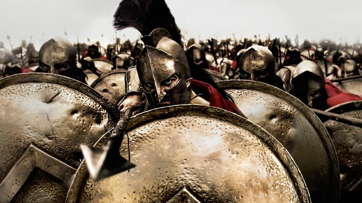 MedievalScholar's tweet photo. My post is also saying that if you aren’t committing to something that looks historical then atleast make the costume look cool. 

300 did it right. It isn’t accurate but it visually looks badass. 

The costumes in that odyssey picture look like shit, so now it’s not even cool OR accurate. It’s just an awful costume now
