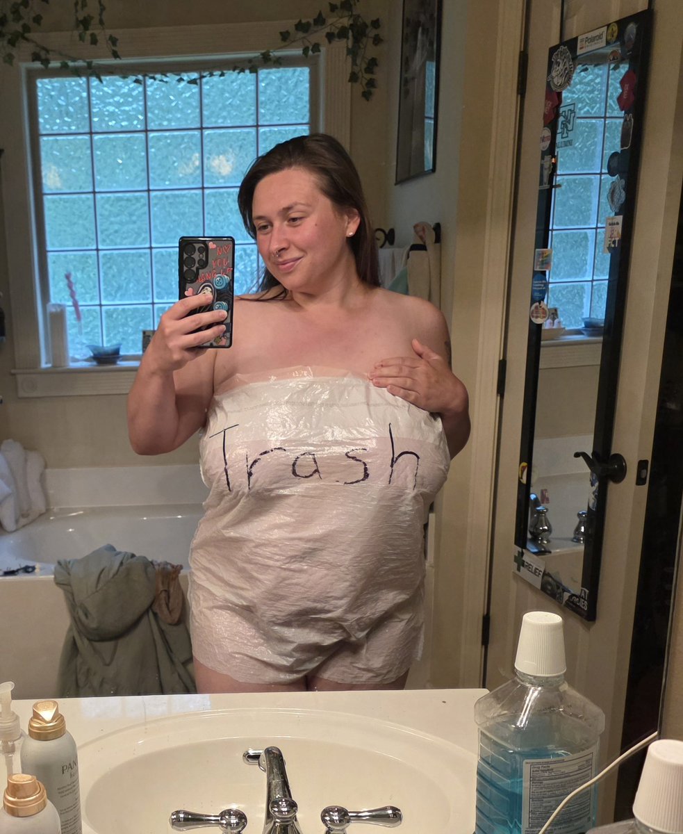 SamanthaEvansXX's tweet photo. You could say all kinds of things using these pictures. I made this trash bag dress today for some Tiktoks. Thought about posting to Instagram, but they might be too spicy for that site. I like to make social commentary. Always looking hot while doing it too 😁 https://t.co/NoiLSz2rmr