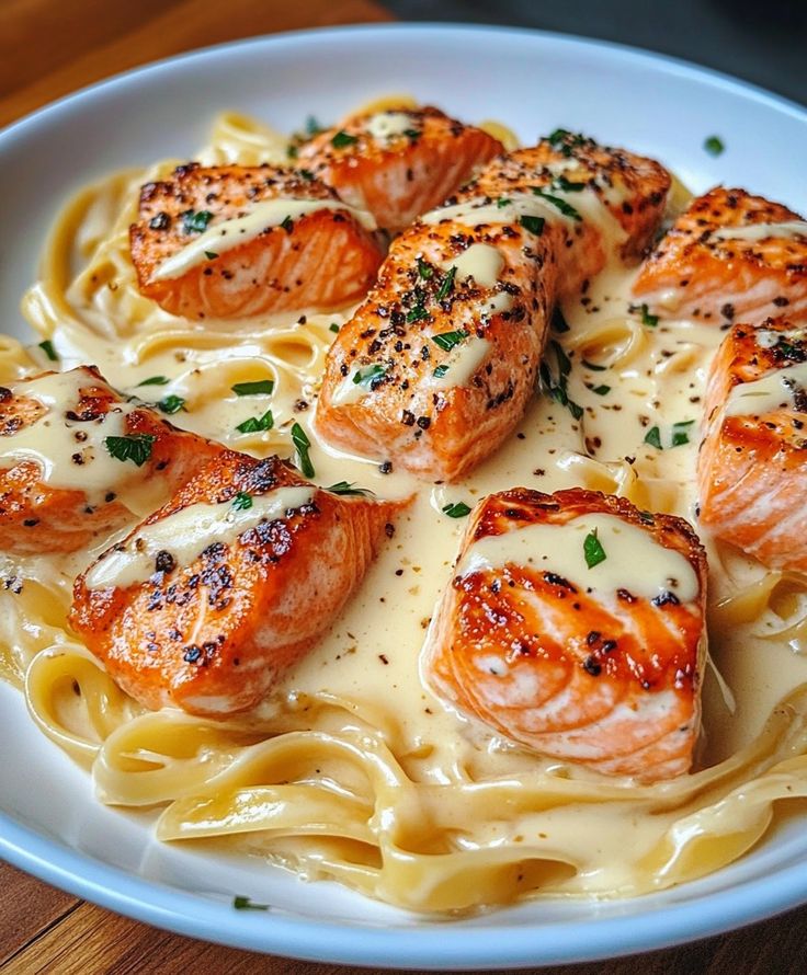 Golden-seared salmon over creamy pasta—🍝🐟✨