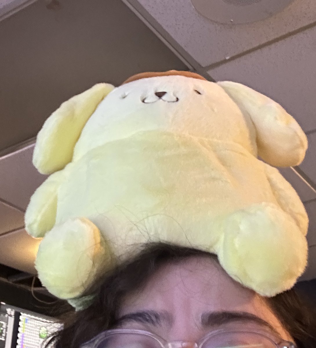 Britixo's tweet photo. Coworker walked in while I was being a silly goose earlier- I didn’t know how to explain to him why Pompompurin was on my head 😭 https://t.co/4bAdtagGjR