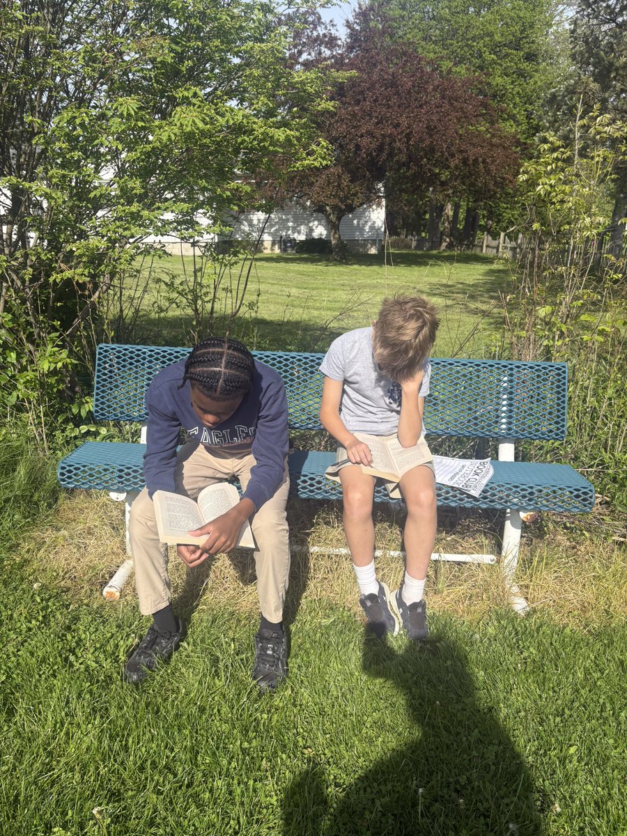 HTSNovak's tweet photo. 7B ELA Book Club is in full effect! Your students have their heads in a book, quite literally! They are engaged in reading, hosting book club meetings, sharing in leadership roles with discussions and having fun in the sun! https://t.co/1pVjiCUZKV