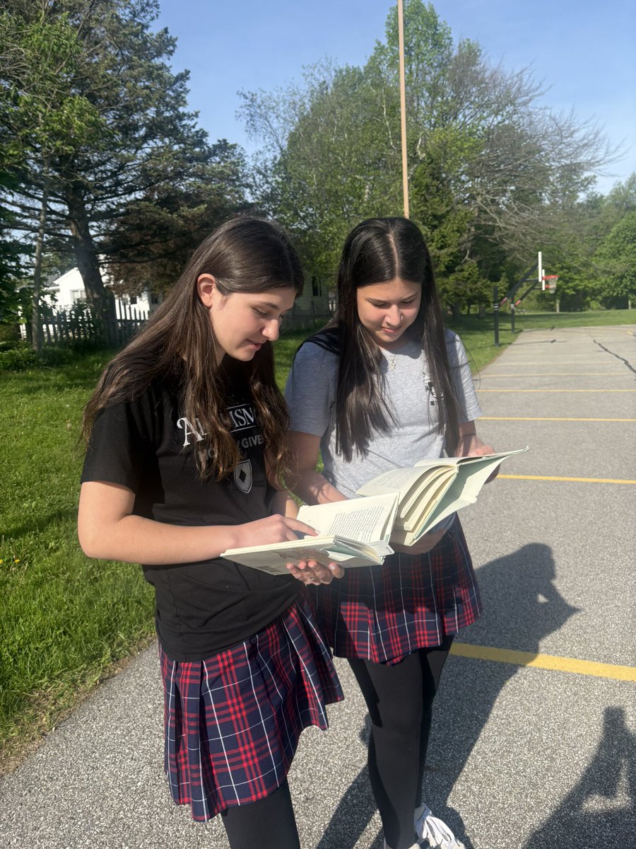 HTSNovak's tweet photo. 7B ELA Book Club is in full effect! Your students have their heads in a book, quite literally! They are engaged in reading, hosting book club meetings, sharing in leadership roles with discussions and having fun in the sun! https://t.co/1pVjiCUZKV