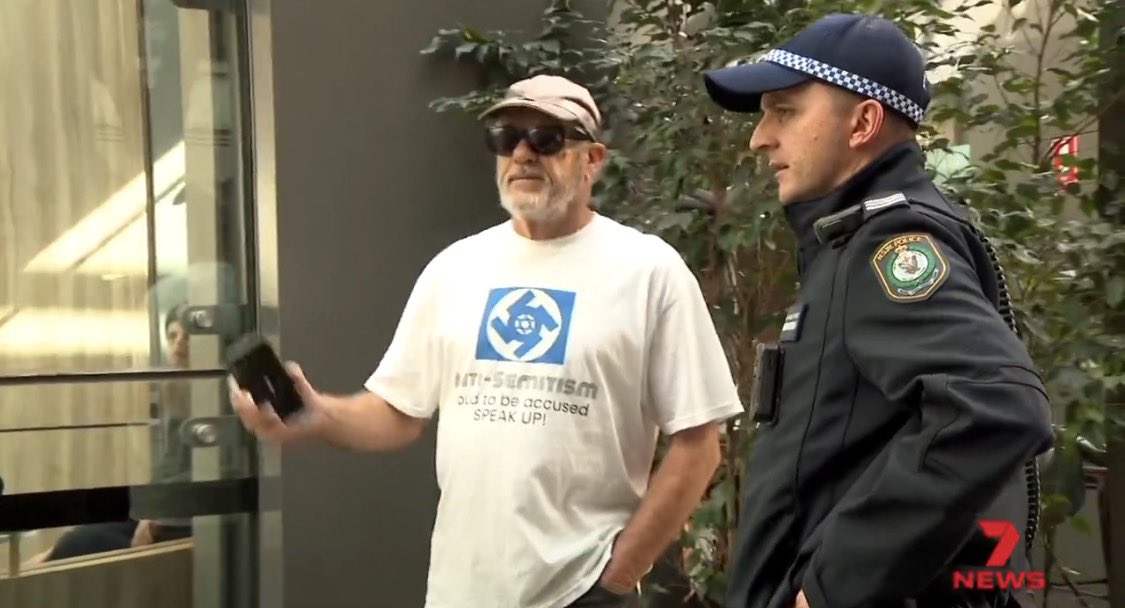 Ian Minus wore a swastika-over-Israel flag shirt screaming “proud to be ...