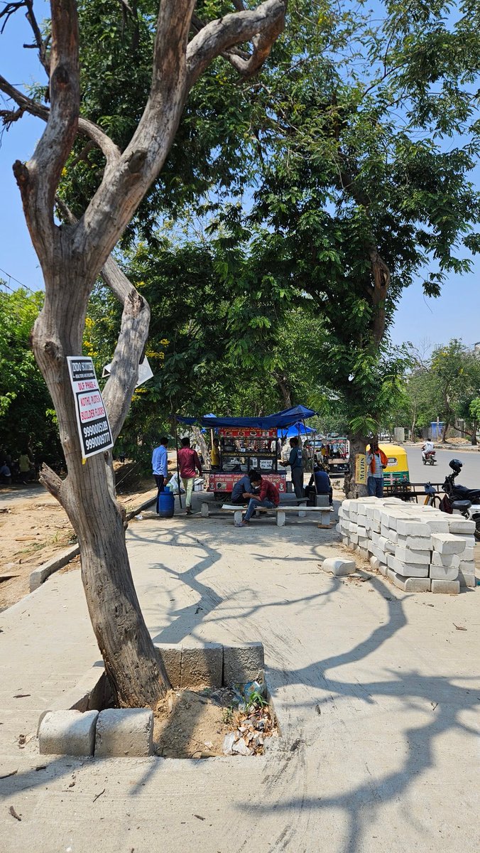 Apollyon7's tweet photo. This is encroachment of the newly built pedestrian way (Ham liilton Galleria Road). Made for civilians to walk but encroachmenlike these have ruined the effort of @OfficialGMDA @MunCorpGurugram @DC_Gurugram @cmohry @DiprHaryana @diprogurugram1 @TrafficGGM https://t.co/7K7le6FPdy
