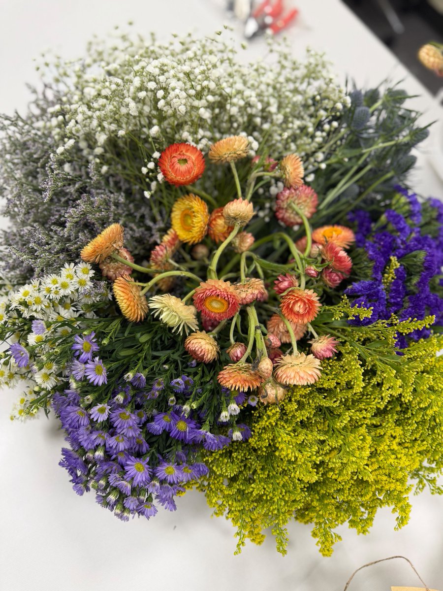 agvance's tweet photo. 💐Nothing says May Day like fresh flowers! 🌸
A huge thank‑you to our resident florist, Kaylee Agney, for setting up a gorgeous flower bar and bringing a little extra sunshine to the SSI team today. https://t.co/4WVZNSQZKi