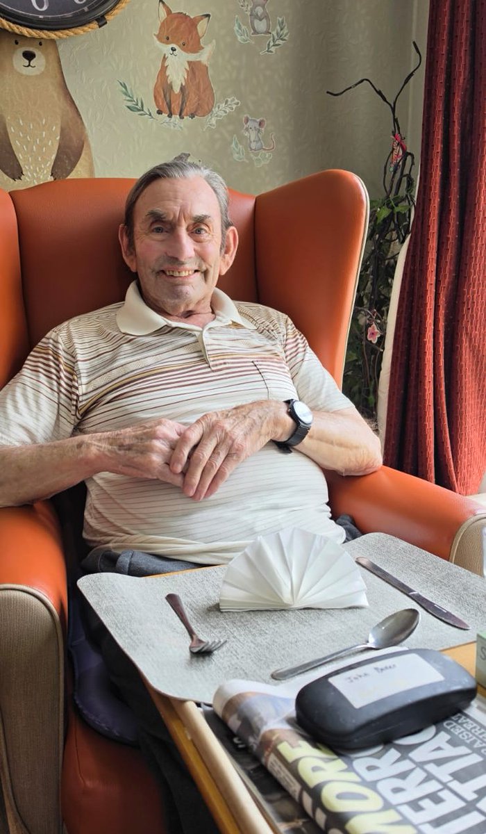 EdenmoreNH's tweet photo. A table set for more than just a meal. Puzzles, a soft toy, or a newspaper become something to pick up or look at while sitting down to eat. For those who take a little longer to eat, having something nearby to focus on and engage with can make all the difference. #devoncarehome https://t.co/nK26xFp9Kh