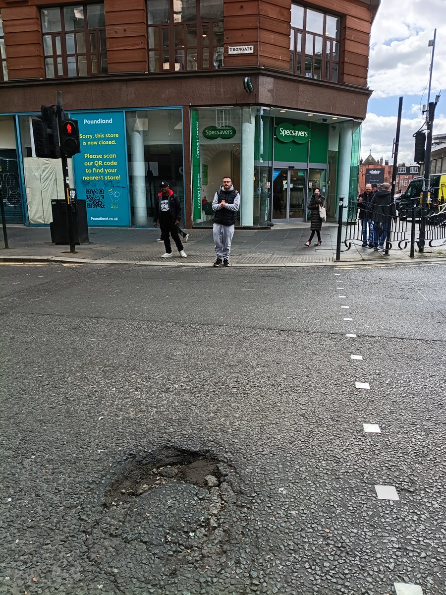 stuartf8136's tweet photo. @MyGlasgowCC hi I'm 79,walk with an aid.can you get this pothole filled.corner trongate/glassford street. https://t.co/x2S7i7FJL5