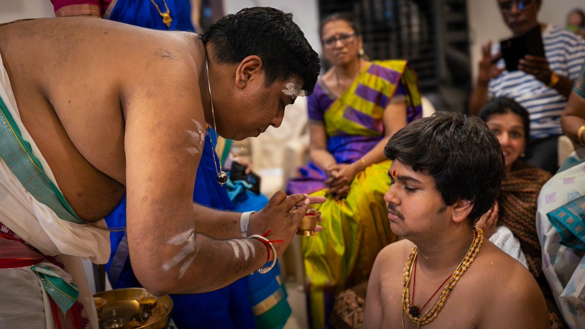VedaGhosham's tweet photo. ✨Sri Swaminathan Balasubramaniam from Mumbai our Veda Ghosham student did his son's upanayana Chi  Rishab Swaminathan on this Sunday. He too was an attendee of our " Upanayana training in Vedic way".

Instead of doing the upanayana at banquet hall, 🏢 he chose to do it at home with limited relatives only.

Why is this important? It's because shastra says that we build house 🏡 for performing Samskara karmas like upanayana, vivaha etc for our children. So house was considered not just a shelter but a place for performing Vedic activities. He, like many other Veda Ghosham students didn't waste money in banquet hall & extravagance 🎉 🥳 but focussed on correctness ▶️ of the samskara & did the entire function at home. Looking at this father's dedication his young son didn't resist for Vapanam (head shave) for upanayana. He said when my father is doing so much, why can't I follow shastras and do what our Rishis have said. 📚 

Veda Ghosham makes people go back to their roots & grounds them to tenets of our illustrious Sanatana Dharma 🚩

#WeAreVedaGhosham #TransformingSanatanis #Upanayana #Poonal