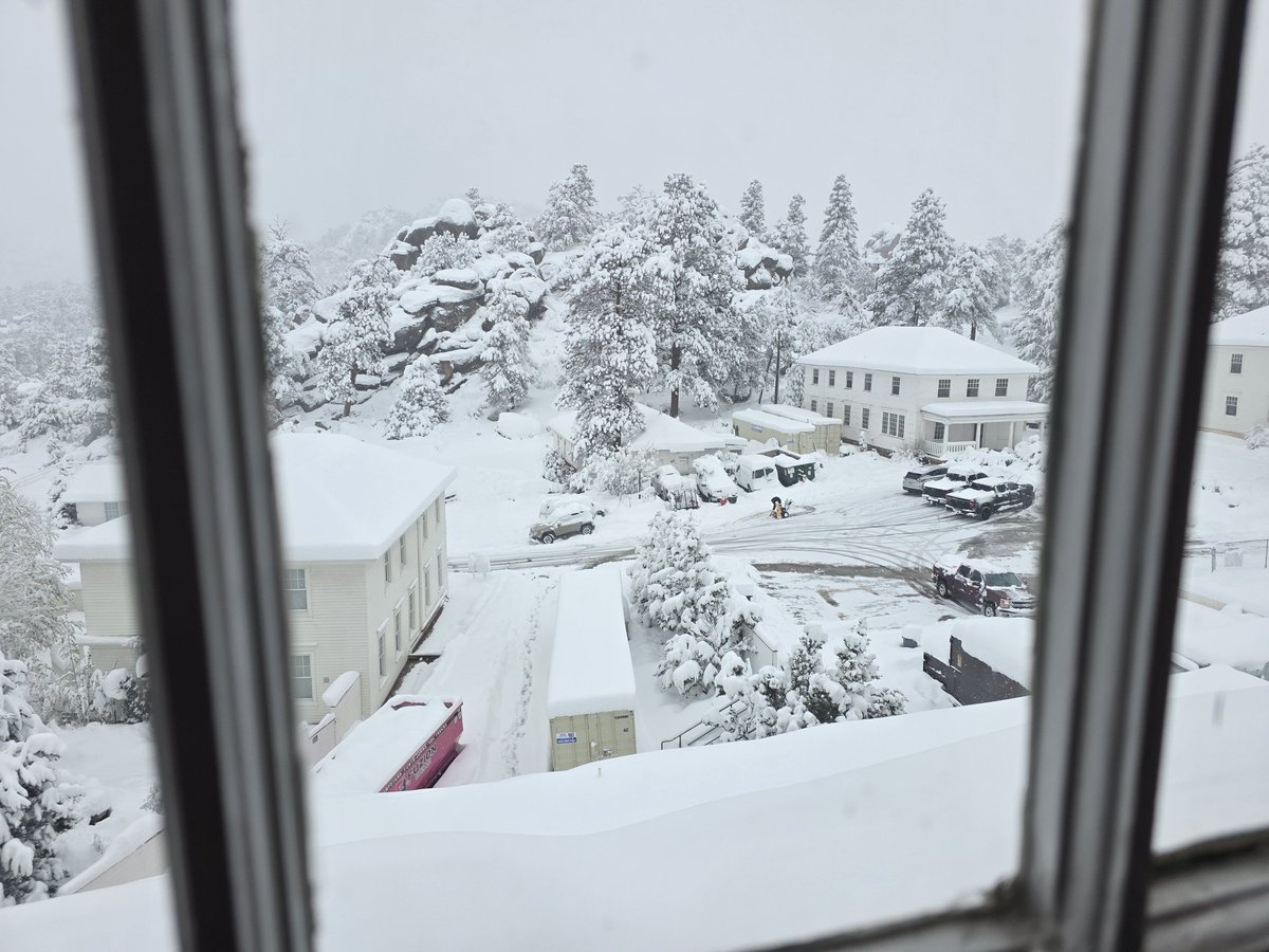 My hotel room window. Buried in over a foot of snow. It's still snowing.
