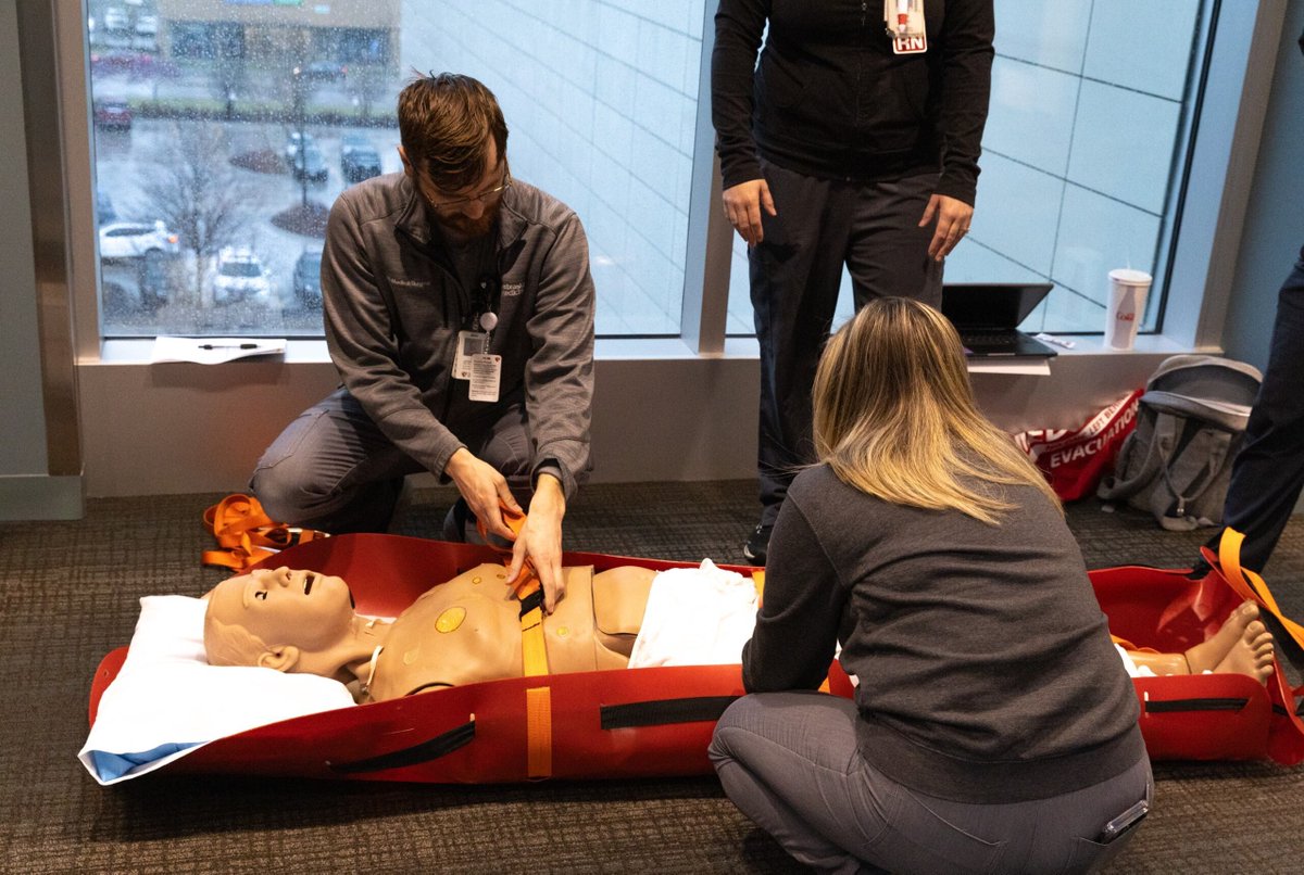 UNMC_iEXCEL's tweet photo. From patient room to stairwell, every part of the building can become a simulation space. Nebraska Medicine nurses recently trained for emergency evacuation scenarios, practicing how to safely and efficiently move ICU patients with a med sled! https://t.co/rE2p8OTEsa