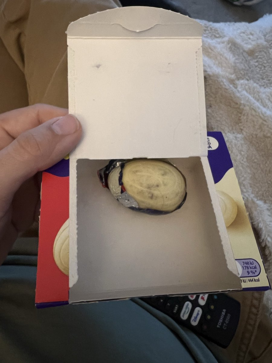 Alastairdf's tweet photo. @CadburyUK just opened my cream eggs box to find one of the eggs like this. Very disgusting. https://t.co/HxZumbwWrr