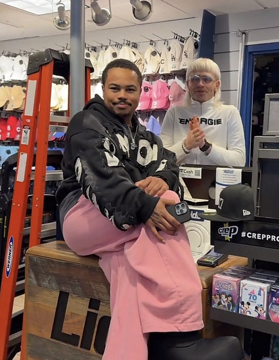 NOW HE GOT HIM WHITE SOX MERCH 😭😭