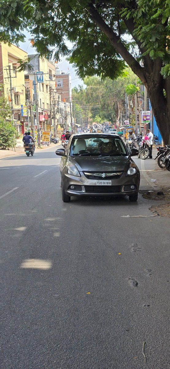 Khm951H's tweet photo. @HYDTP Parked in the middle of the road occupying the entire lane. Please issue challan. Street no 8, Habsiguda, Hyderabad, 500007 https://t.co/TX8fv84z7e