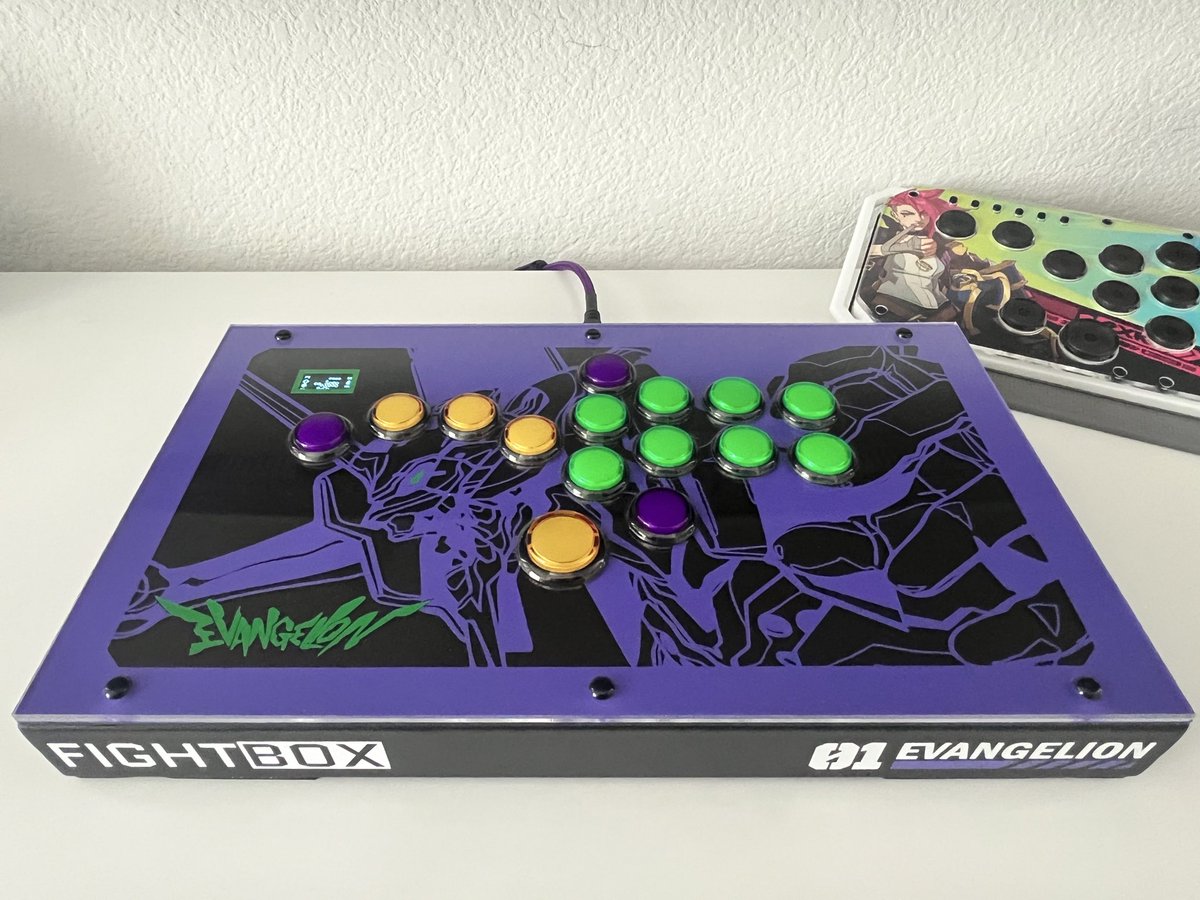djdose's tweet photo. The F10 with Gen-5 is still my main. Some subtle updates this. Wrapped DIY art panel with Demon Black auto vinyl on bottom, and matte purple and green vinyl on top, giving it slight depth. 

@FightBoxArcade_ F10
@brookgamingfans Gen-5 board w/ screen
@QANBA  Gravity KS buttons https://t.co/vHCDROYEEz