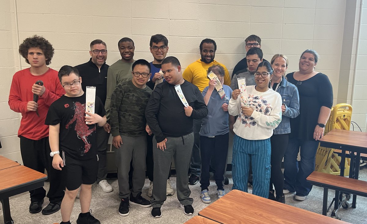 pnwboces's tweet photo. Transitions students at PNW BOCES created beaded lanyards for SchoolAI, an artificial intelligence platform for teachers, to give out to educators at conferences. Trevor Goertzen, from SchoolAI, dropped by today to show his appreciation with a pizza party for the students. “Teachers have told us how much they love the lanyards because they are all unique and come with personal messages from the students,” said Goertzen, who is from Kansas City. #pnwboces #wecandothat