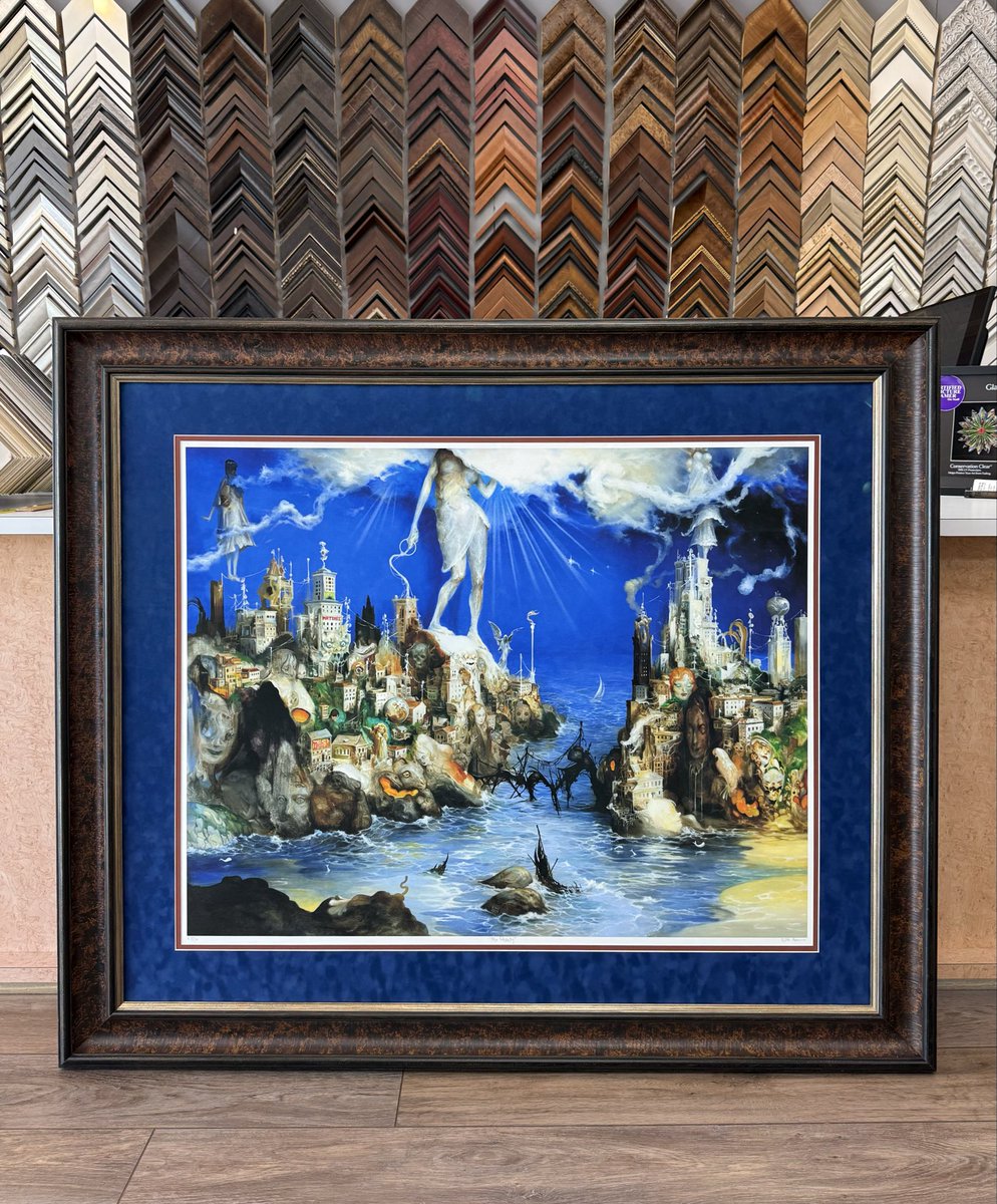 FrameArtShop's tweet photo. Two striking works by Esao Andrews — The Shanty &amp; The Range — transformed into true statement pieces.
We paired each with rich suede mats, wide dark mouldings with subtle bossed detail, and museum glass to elevate every color, texture, and surreal detail. https://t.co/m9mWFhZzak