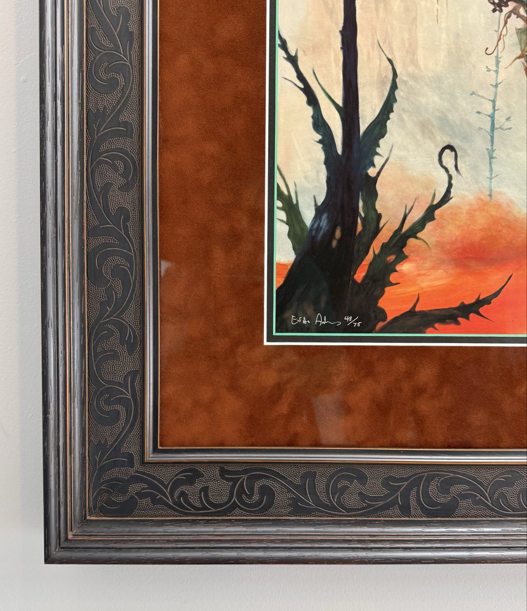 FrameArtShop's tweet photo. Two striking works by Esao Andrews — The Shanty &amp; The Range — transformed into true statement pieces.
We paired each with rich suede mats, wide dark mouldings with subtle bossed detail, and museum glass to elevate every color, texture, and surreal detail. https://t.co/m9mWFhZzak