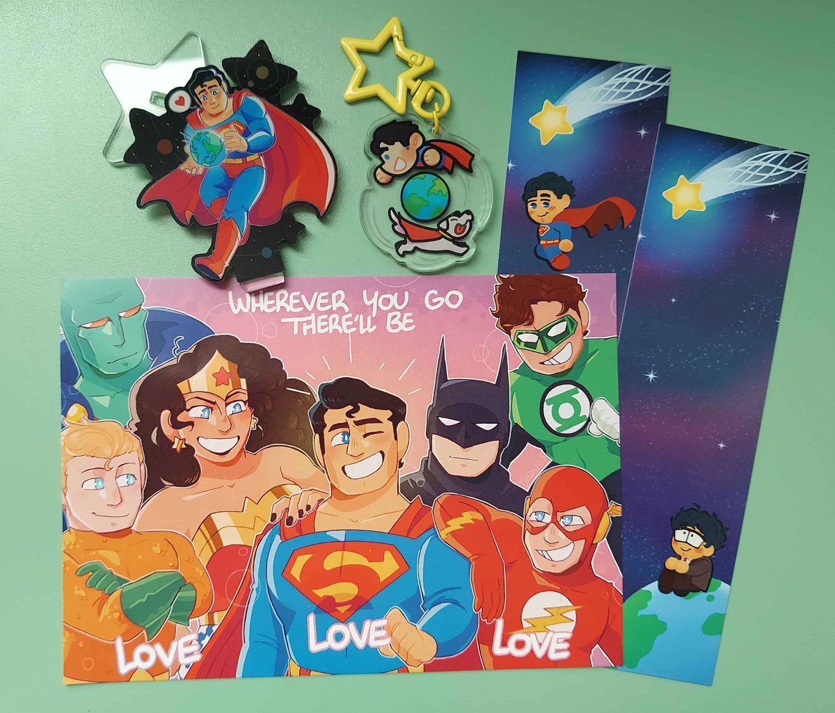 Hi, we have some production updates!

Most of our production is complete, with all of our merch items in hand!

We're still waiting on a proof for the zine.

In Production: physical zines
Received: Stickers, bookmark, print, standee, and keychains

So excited to get this to you!