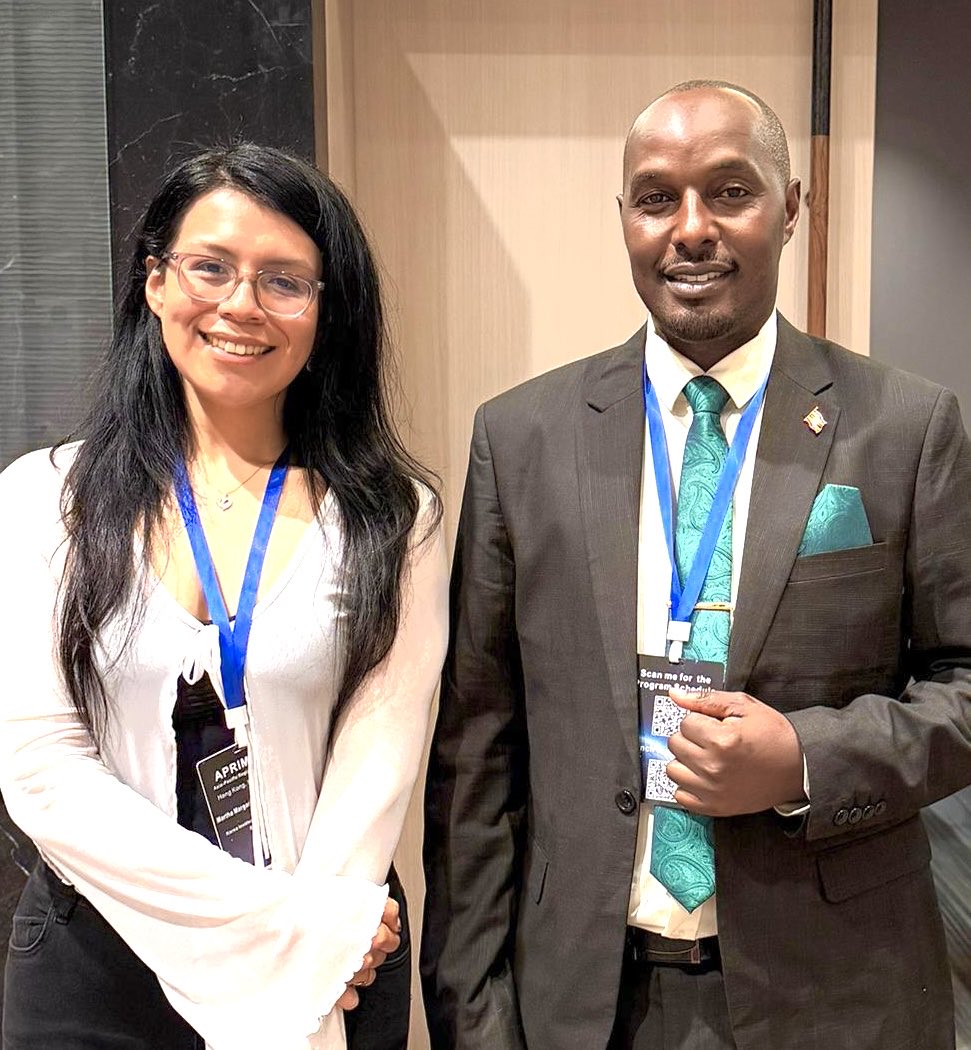 EngJonard's tweet photo. “When the universe speaks in curvature, only spacetime itself becomes the messenger.”

At #APRIM2026, in Current Status & Future Prospects of GW Cosmology presented by Eng. Jonard Asiimwe & Prof. Martha Margarita López Gutiérrez (Korea Institute for Advanced Study, South Korea), the frontier of cosmology is being redefined through gravitational-wave science.

Since the first detection in 2015, over 100 confirmed gravitational-wave events have been recorded, revealing black hole & neutron star mergers & opening a new observational window beyond electromagnetic astronomy. GW cosmology now probes Hubble expansion, dark energy constraints, & early-universe structure formation, with next-generation detectors expected to improve sensitivity by up to 10×, reaching deeper cosmic epochs.

“In every ripple of spacetime, the universe encodes both origin & destiny.” This insight connects detection physics with cosmological evolution, where gravitational waves become direct tracers of cosmic history.

Africa is part of this expanding scientific horizon through growing engagement in astrophysics, data science, and space technology collaboration positioning the continent within the global gravitational-wave research ecosystem.