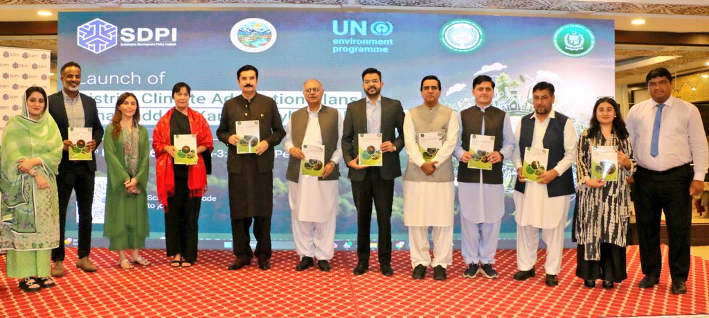SDPIPakistan's tweet photo. Sustainable Development Policy Institute (SDPI) organized Launch of District Adaptation Plans Khyber Pakhtunkhwa, supported by Ministry of Climate Change, Pakistan the UN Environment Programme through NAP team led by Ms Humaira Jahanzeb under #GCF  the Planning & Development Department, Civil Secretariat, Government of Khyber Pakhtunkhwa  in #Peshawar

🌍 Chief Guest, Governor Khyber Pakhtunkhwa Mr Faisal Karim Kundi (@fkkundi ) endorsed the plans & emphasized that climate change is no longer a distant threat but a present-day reality impacting agriculture, infrastructure, livelihoods, communities across KP. He appreciated the collective efforts behind the plans and called for proactive, risk-informed #climate governance and implementation.

📌 Key highlights: 

👉 Secretary Ministry of Climate Change, Pakistan @ClimateChangePK, Ms. Aisha Moriani  stressed that #adaptation must move beyond policy centers and become localized, measurable and accountable through evidence-based implementation and stronger district ownership.

👉 Mr. Muhammad Nadir Khan Rana, Special Secretary P&DD KP, highlighted that #Charsadda and #Karak represent two distinct climate realities, flood vulnerability & drought/water scarcity — requiring differentiated adaptation pathways integrated into planning, budgeting & development systems.

👉 Ms. @Jessica_Troni, Chief, Climate Change Adaptation Unit, UNEP, emphasized that climate adaptation must be “hardwired” into fiscal and planning systems rather than treated as isolated projects. 

👉 Mr. Sami Ullah, Additional Deputy Commissioner (G), #Karak, stressed that drought, groundwater depletion, heat stress & water scarcity are increasingly driving migration and livelihood pressures in Karak. He emphasized the urgency of implementing long-term water management, recharge, and resilience-building measures.

👉 DAPs were presented by Ms Zainab Naeem @ZainabNaeem7 who highlighted 
• 98 prioritized adaptation interventions were identified for #Charsadda
• 74 prioritized interventions were identified for Karak
• all interventions have been costed and phased for implementation
• union council-level vulnerabilities, GIS layers, climate projections, and risk indices were integrated into the plans
• a digital dashboard with AI-assisted planning and visualization tools was launched to support evidence-based decision-making, accountability, and climate finance access, developed in collaboration with AI Geo Navigators 

👉 Discussions throughout the session repeatedly emphasized:
✔ climate-proofing Annual Development Plans (ADPs)
✔ integrating adaptation into PC-I to PC-V processes
✔ strengthening climate budget tagging
✔ developing bankable adaptation projects

👉 In his concluding remarks, Dr. Ihtesham-ul-Haq, Chief, IDS Section, P&DD KP, stated that climate change has become the “new normal”, emphasized that adaptation planning must not remain confined to shelf documents.

Download DAPs: 
https://t.co/CpmtiLHw1x
https://t.co/eaouOiNTgk