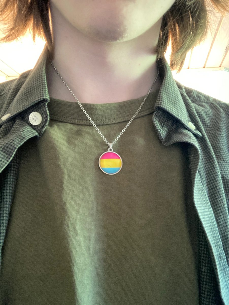 TheTweetBit's tweet photo. Got my swag on. Bought a pan pin and pendant recently.
Initially I didn’t really care too much about the pendant since it was a bundle, but as it turns out I quite enjoy wearing it. 
Never worn a pendant or anything to represent myself, it’s nice https://t.co/KPzDj48Ysr