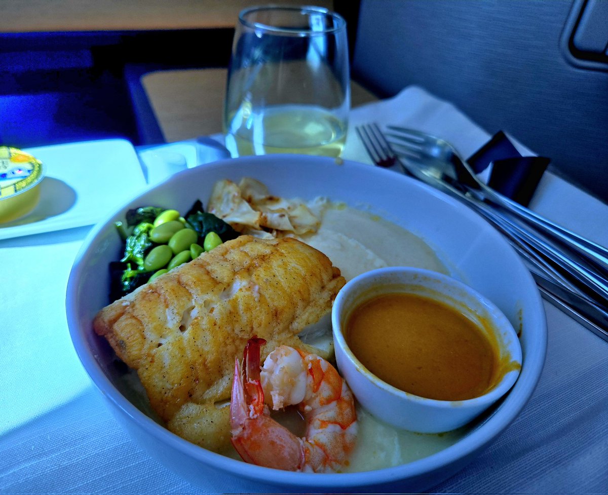 CKaway's tweet photo. One of the best business class airline meals ever. @AmericanAir nailed it on my LHR to ORD flight. The cod was cooked perfectly, the root veggies and puree were divine, and the healthy dose of greens finished the plate well. Great service too. https://t.co/B5bfbTf9Li