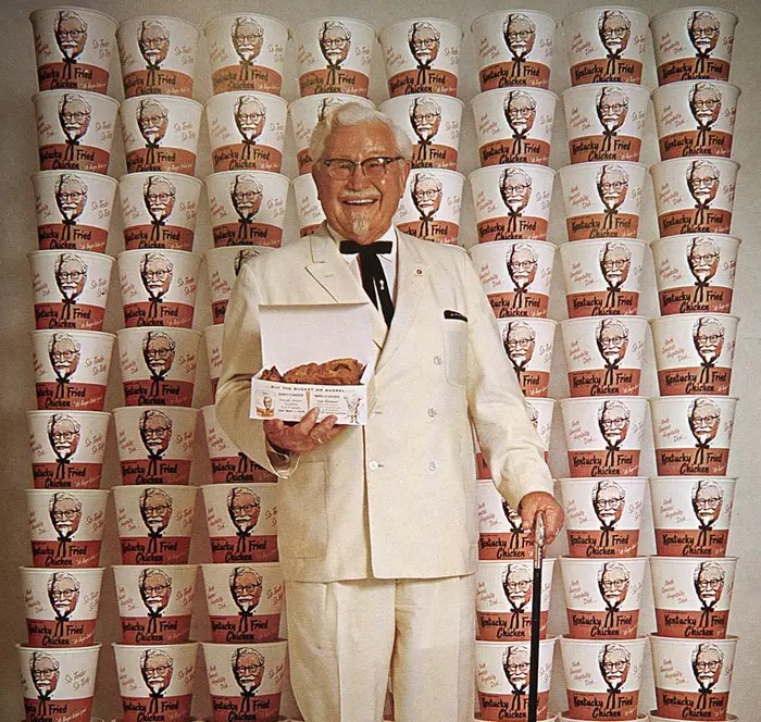 AUsername360's tweet photo. @KFC_ES Question: Does 『Bohemian Raphsody』 bring all the Colonel Sanders signs and statues to life, or not? He was a real person, but KFC's marketing team treats him as a fictional character. https://t.co/4TfVPMfWLl
