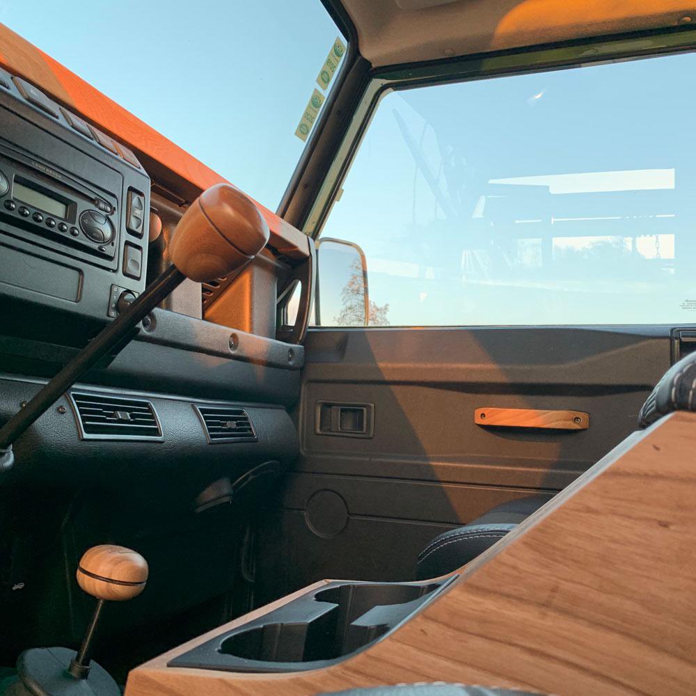 Mutai___'s tweet photo. Seen this company that makes wood trims for defenders. Cubby boxes, dashboard pads, door handles, vent  levers and gear knobs. And you get to choose the type of wood you want.  2026 be kind, I just need a go everywhere car thats mint. @CraigKitiliCj  @alexmwanzo ipo siku https://t.co/Wa5Bnye8MR