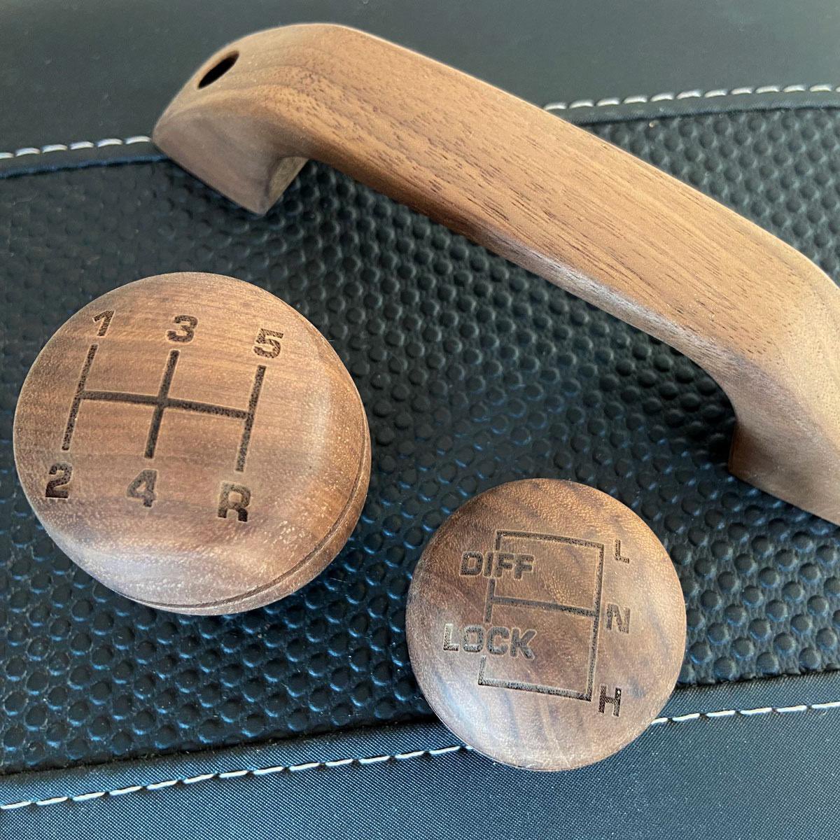 Mutai___'s tweet photo. Seen this company that makes wood trims for defenders. Cubby boxes, dashboard pads, door handles, vent  levers and gear knobs. And you get to choose the type of wood you want.  2026 be kind, I just need a go everywhere car thats mint. @CraigKitiliCj  @alexmwanzo ipo siku https://t.co/Wa5Bnye8MR