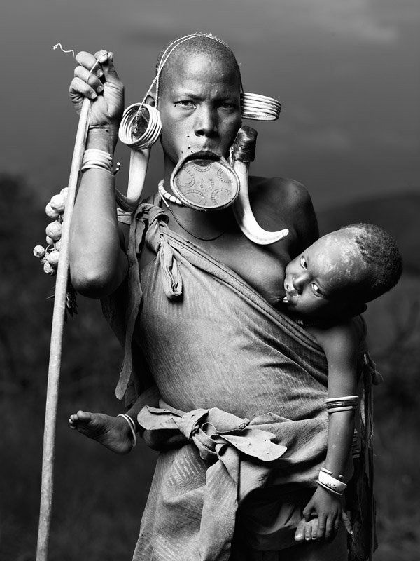<a href="/MR_LUWAYO/">𝑴𝑹 𝑳𝑼𝑾𝑨𝒀𝑶 ᴏꜰꜰɪᴄɪᴀʟ ♕🇬🇧</a> The lip plate is a traditional cultural ornament worn by some ethnic groups in parts of Ethiopia and South Sudan, especially among groups like the Mursi and Surma people.

it is commonly associated with:
Beauty and cultural identity
Womanhood and maturity
Social status or pride