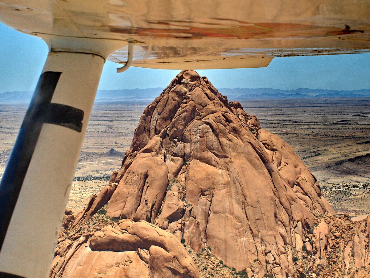 QuallaExplores's tweet photo. Granite inselbergs nicknamed the Matterhorn of Namibia rise from flat desert plains, sheltering San rock art, rock hyraxes, and campsites run by a local women's cooperative.

https://t.co/Nxg96VnPnz

#Namibia #Geology #RockArt https://t.co/w1A1s3bDGj