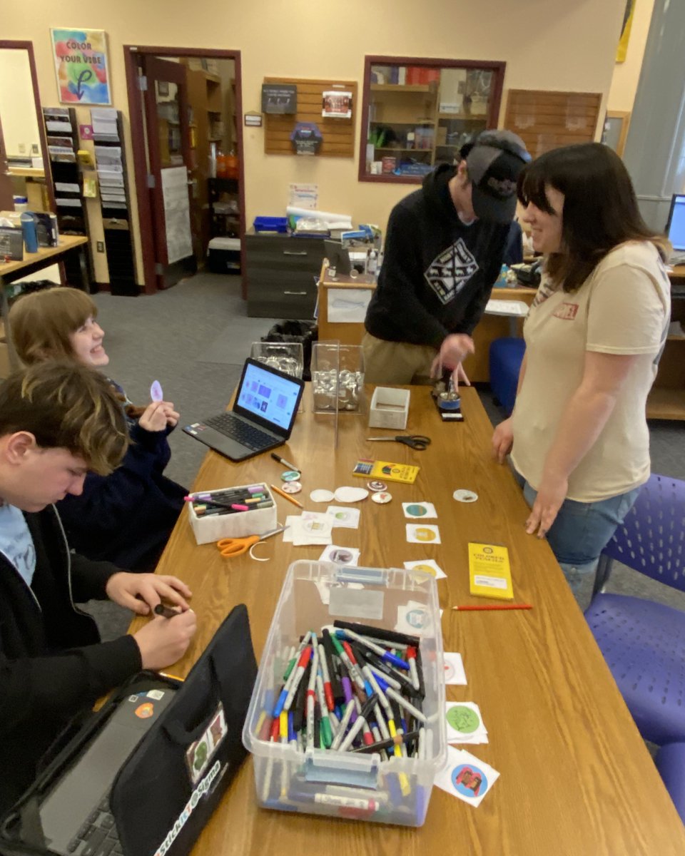 TimberlaneHS's tweet photo. The TRHS Library supported Mental Health Awareness Week by hosting a variety of activities and events throughout the week. Students and staff took part in button making, created mini bookshelves and crafted sun catchers, along with other calming activities like coloring. https://t.co/9CQGML7PAN