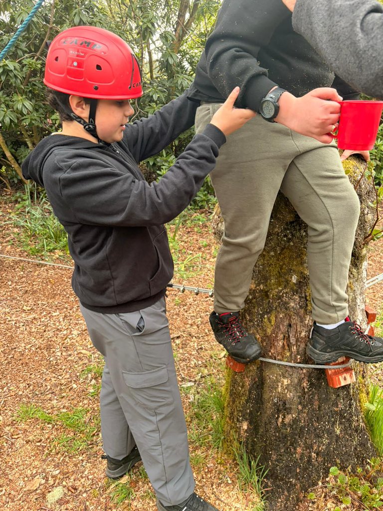HolyNameRCPS's tweet photo. Low ropes challenge - working as a team to travel without spilling the water! They had to spot other campers 🏕️ https://t.co/bVpzTTJYig