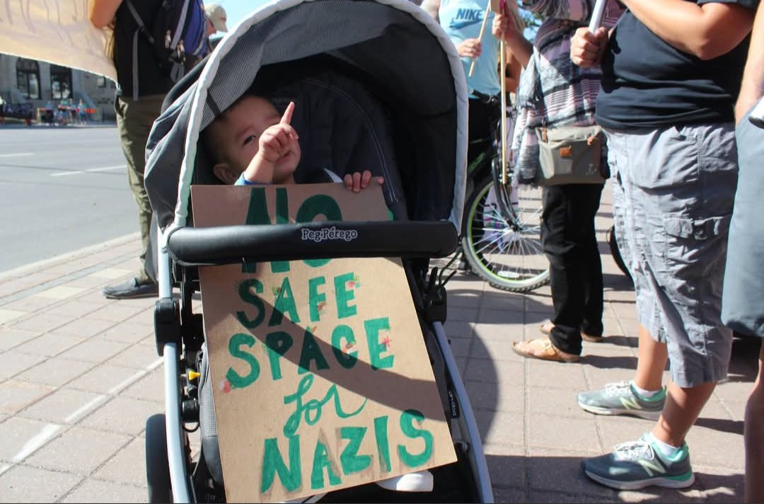 Union__Jacks's tweet photo. @NoLore This I did not know! Gonna read your piece 😌
Yea, we have a strong tradition here.
My son spent his 1st birthday at an anti-fascist rally in 2017 🤣
(The fascists skipped their planned event in Wpg cause it was gonna be 1934 part deux) https://t.co/UMbG49Ka5L