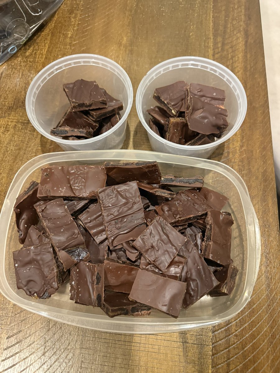 justus__space's tweet photo. Made chocolates the other night after work! Rolled out and flattened dates covered with a layer of peanut butter for a soft gooey center, and covered on both sides with melted dark chocolate and flaky sea salt https://t.co/N8I5n5rbkx
