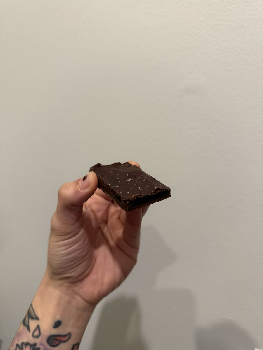 justus__space's tweet photo. Made chocolates the other night after work! Rolled out and flattened dates covered with a layer of peanut butter for a soft gooey center, and covered on both sides with melted dark chocolate and flaky sea salt https://t.co/N8I5n5rbkx
