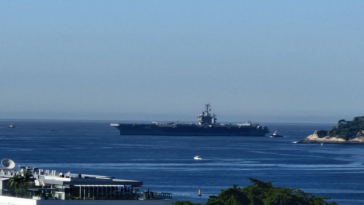 WarshipCam's tweet photo. USS Nimitz (CVN 68) Nimitz-class aircraft carrier and USNS Patuxent (T-AO-201) Henry J. Kaiser-class replenishment oiler along with a Brazilian attack submarine in Rio de Janeiro, Brazil - May 7, 2026     SRC: X-@dmdst12 https://t.co/Qch7agZEDJ