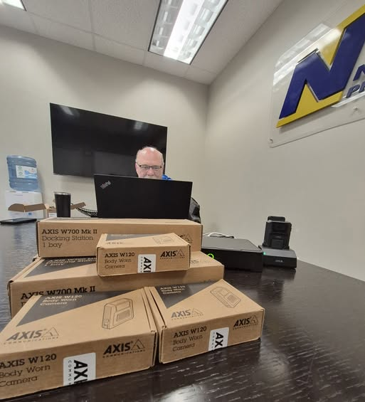 NortheasternPro's tweet photo. Our technician, Robert, is preparing a group of Axis Body Worn cameras for deployment. Body worn cameras can be used by various personnel to accurately record events in real time. You can save the video to your existing video network, livestream video, or track personnel with GPS https://t.co/AV728OLcvp