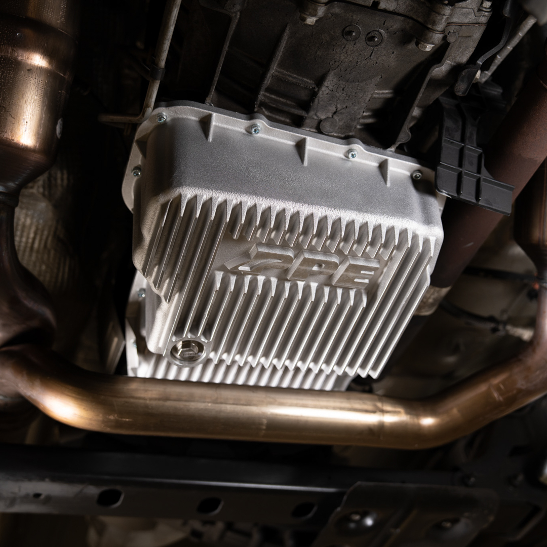 PPE_Power's tweet photo. 🚨 NEW PRODUCT LAUNCH 🚨

The new PPE Heavy-Duty Cast Aluminum Transmission Pan for 2011–2018 RAM 1500/2500/3500 and 2010–2013 Jeep Grand Cherokee 65RFE transmission is here. 

More capacity, better cooling, stronger than stock.

Available in Raw, Brushed, and Black.

#PPEpower https://t.co/bHX46opjAE