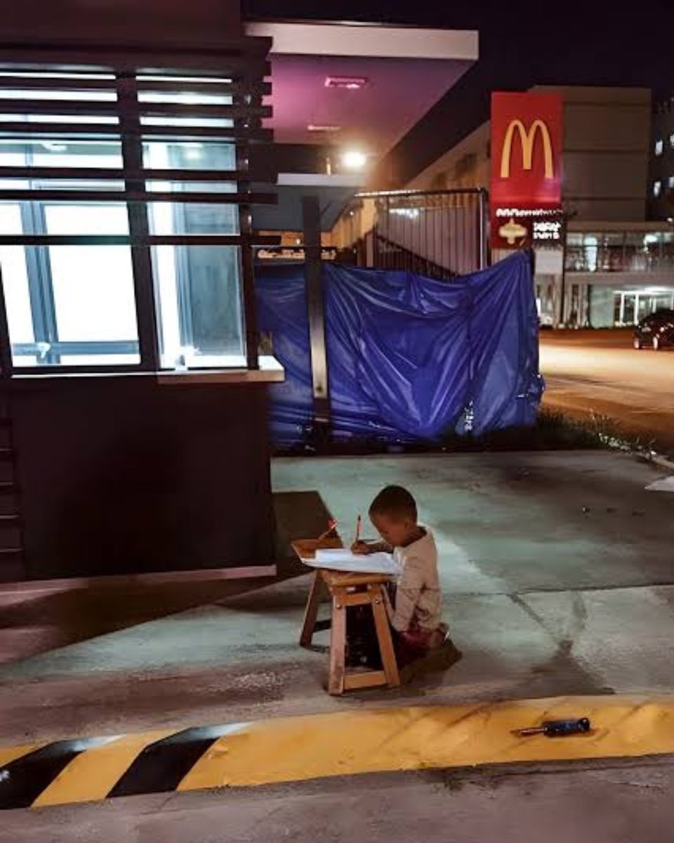 I wonder what this little boy is up to now. 

Back in 2015, a college student in the central Philippines walked past a McDonald’s drive-through at night and saw a nine-year-old kneeling on the pavement, using a wooden stool as a desk, finishing his homework by the light spilling