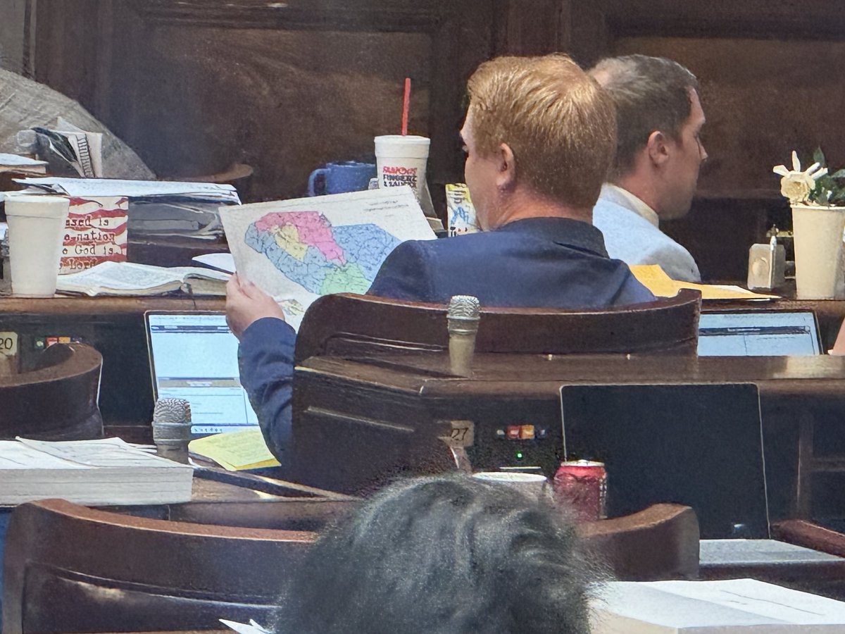 JoeBReporter's tweet photo. In the SC House chamber, looks like a proposed congressional map is being passed around/distributed. https://t.co/TAncMVGNx3