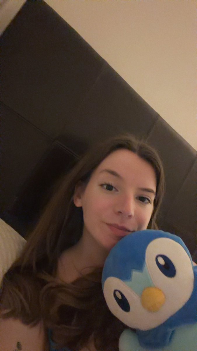 Just a girl and her piplup chilling while her man plays video games 😅😅