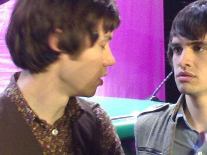 hes closing his eyes so he can kiss brendon but brendon is too shy